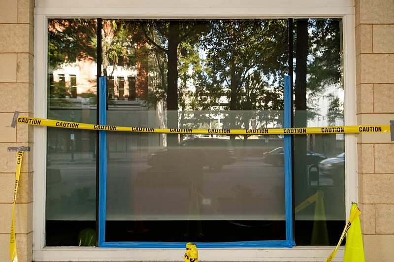 Staff photo by Doug Strickland / 
Partly broken windows are seen on the 600 block of Market Street on Tuesday, July 2, 2019, in Chattanooga, Tenn.