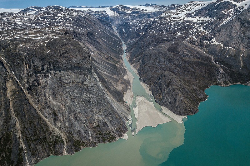 A sand delta spreads into the water north of Sermilik Fjord in Greenland as climate change melts the island's ice. (Ben C. Solomon/The New York Times)