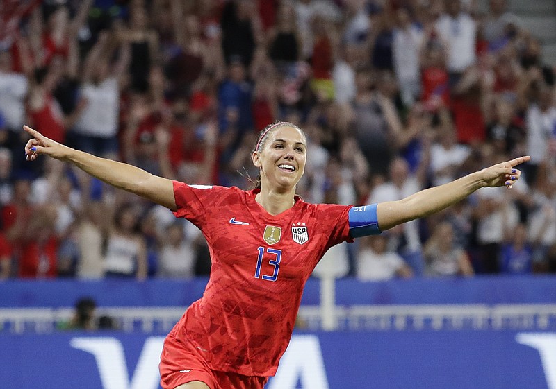 United States' Alex Morgan celebrates after scoring her side's second goal during the Women's World Cup semifinal soccer match between England and the United States, at the Stade de Lyon, outside Lyon, France, Tuesday, July 2, 2019. (AP Photo/Alessandra Tarantino)