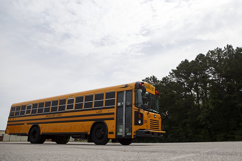 A new school bus, provided by First Student Inc., is seen at the Hamilton County Department of Education on Wednesday, July 3, 2019 in Chattanooga, Tenn. First Student Inc. is providing the county with 185 new state-of-the-art buses which include GPS tracking systems, digital cameras, air conditioning and other features.
