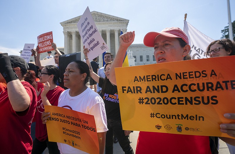 FILE - In this June 27, 2019, file photo, demonstrators gather at the Supreme Court as the justices finish the term with key decisions on gerrymandering and a census case involving an attempt by the Trump administration to ask everyone about their citizenship status in the 2020 census. (AP Photo/J. Scott Applewhite, File)