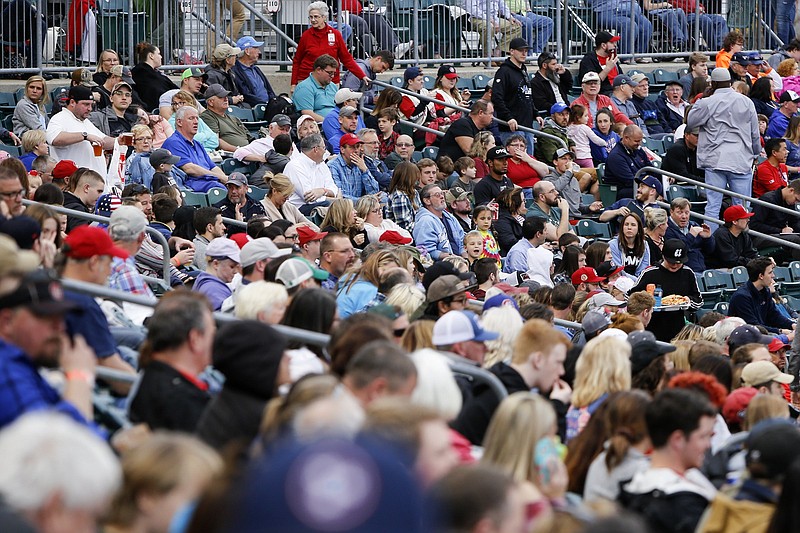 Fans fill the stands on opening night at AT&T Field for a Southern League baseball game between the host Chattanooga Lookouts and the Montgomery Biscuits on April 4.