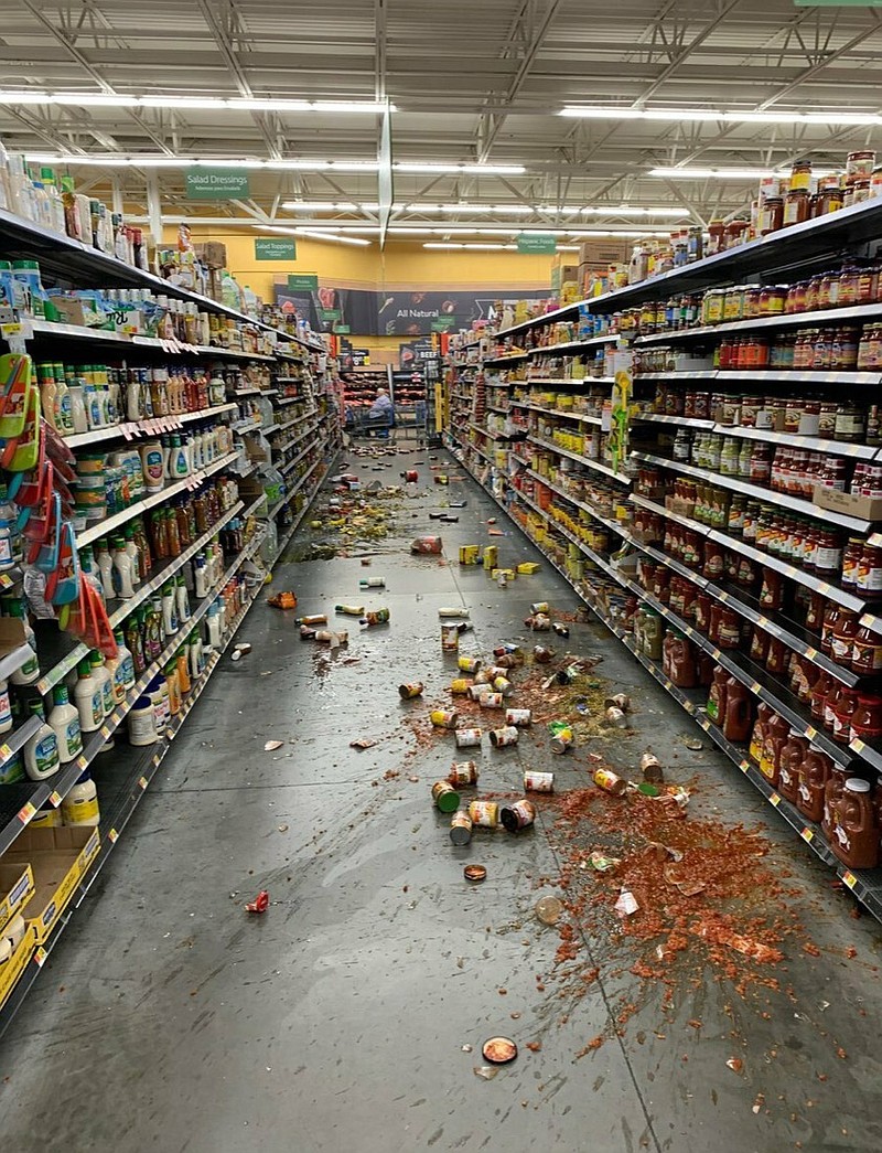 Food that fell from the shelves litters the floor of an aisle at a Walmart following an earthquake in Yucca Yalley, Calif., on Friday, July 5, 2019. (Chad Mayes via AP)