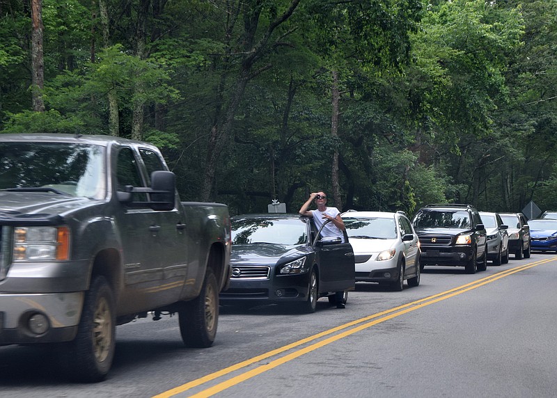 Staff file photo by Ben Benton / Tennessee Department of Transportation officials said in 2018 that weather and traffic delays were slowing the slide repair work on State Route 68 west of Spring City in Rhea County, Tenn. Here, after traffic was stopped for a lengthy delivery of materials, traffic heads down the mountain while a long line of motorists headed up wait their turn with varying levels of patience.