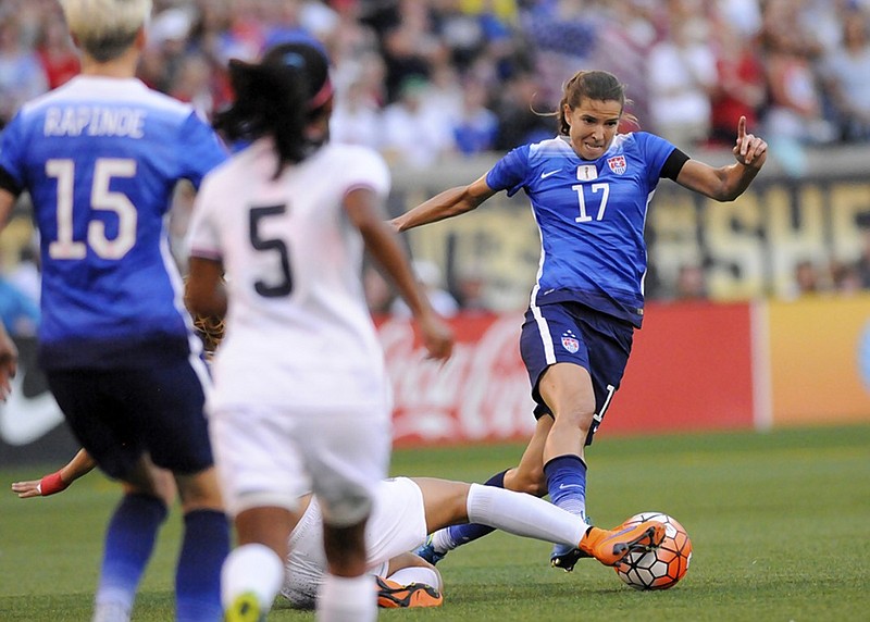The United States' Tobin Heath (17) tries to get around a tackle attempt by Costa Rica's Fabiola Villalobos during an exhibition match on Aug. 19, 2015, at Finley Stadium in Chattanooga. The U.S. team was visiting as part of its victory tour after the 2015 Women's World Cup in Canada. The Americans repeated as champions by beating the Netherlands 2-0 on Sunday in France.