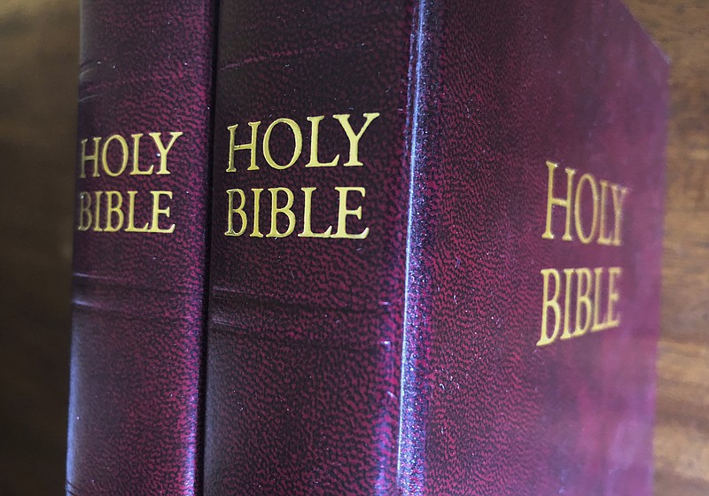 In this July 5, 2019 Bibles are displayed in Miami. Religious publishers say President Trump's most recently proposed tariffs on Chinese imports could result in a Bible shortage. That's because millions of Bibles, some estimates put it at 150 million or more, are now printed in China each year. Critics of a proposed tariff say it would not only make the Bible more expensive for consumers, it would also hurt the evangelical efforts of Christian organizations that give away Bibles as part of their ministry. (AP Photo/Marta Lavandier)