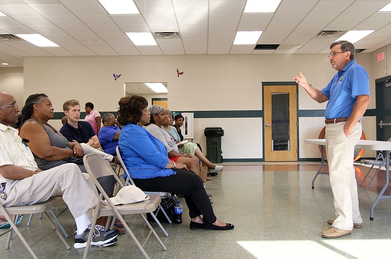 District 1 Councilman Chip Henderson answers questions about short-term vacation rentals during a community meeting at Eastdale Youth and Family Development Center Monday, July 8, 2019 in Chattanooga, Tennessee. The meeting concluded with a vote to determine whether attendees wanted to have the ability to have short-term vacation rentals or not.