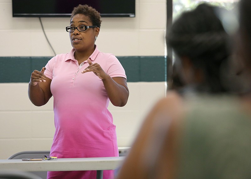 Chattanooga councilwoman Demetrus Coonrod opens up a community meeting at Eastdale Youth and Family Development Center Monday, July 8, 2019 in Chattanooga, Tennessee. The meeting was held for her constituents in District 9 to let her know whether or not they wanted to have the ability for short-term vacation rentals in their communities.
