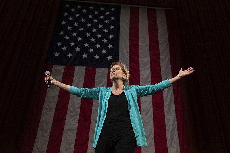 In this June 28, 2019 photo, Democratic presidential candidate Sen. Elizabeth Warren, D-Mass., arrives at Chicago's Auditorium Theater at Roosevelt University for a Chicago Town Hall event. Several Democratic White House hopefuls are explicitly connecting their faith to their agendas, making a values-based appeal to religious swing voters who will be critical in next year s election after white evangelicals broke heavily for President Donald Trump. (AP Photo/Amr Alfiky)