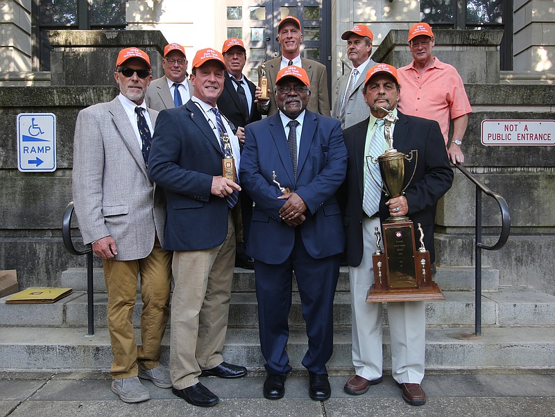 Members of the 1969 Little League World Series champion team pose for a photo during a Chattanooga City Council meeting Tuesday, July 9, 2019 in Chattanooga, Tennessee. They were honored on the 50-year anniversary of their win.