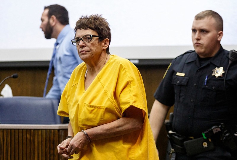 Janet Hinds is led into a courtroom for a preliminary hearing before Judge Alex McVeagh at the Hamilton County-Chattanooga Courts Building on Tuesday, March 5, 2019, in Chattanooga, Tenn. Judge McVeagh bound charges against Hinds in the Feb. 23 hit-and-run death of Chattanooga Police Officer Nicholas Galinger over to a grand jury.