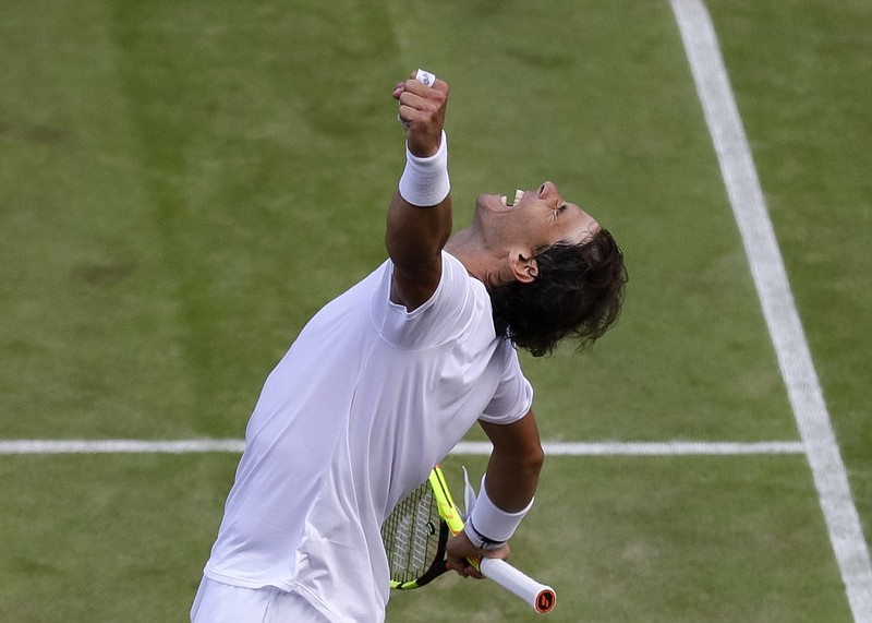 Rafael Nadal celebrates after beating Sam Querrey in a quarterfinal Wednesday at Wimbledon.