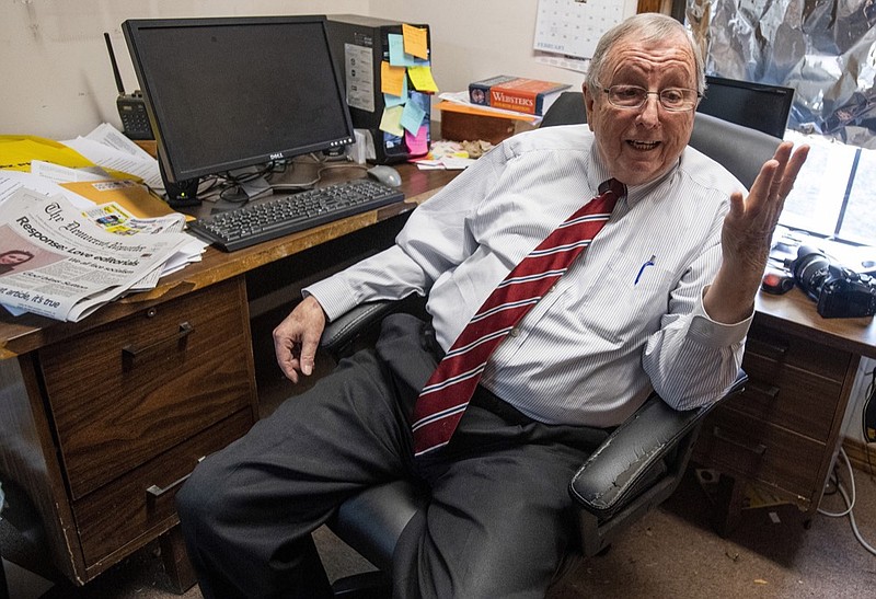 FILE - In this Feb. 21, 2019, file photo, Goodloe Sutton, publisher of the Democrat-Reporter newspaper, speaks during an interview at the newspaper's office in Linden, Ala. Tommy Wells, the new owner Democrat-Reporter, says longtime editor Goodloe Sutton has sold out and retired months after calling for a revival of the Ku Klux Klan. Sutton received widespread attention earlier this year after publishing an editorial that advocated a return of the KKK to deal with Democrats in Washington. (Mickey Welsh/Montgomery Advertiser via AP, File)