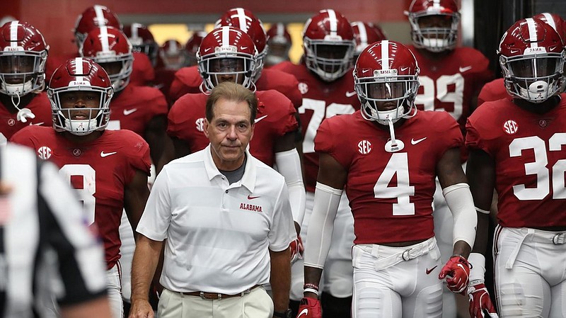 Alabama football coach Nick Saban, receiver Jerry Jeudy (4) and linebacker Dylan Moses (32) will be among the Crimson Tide contingent this week as the SEC stages its annual media days event in the Birmingham suburb of Hoover.