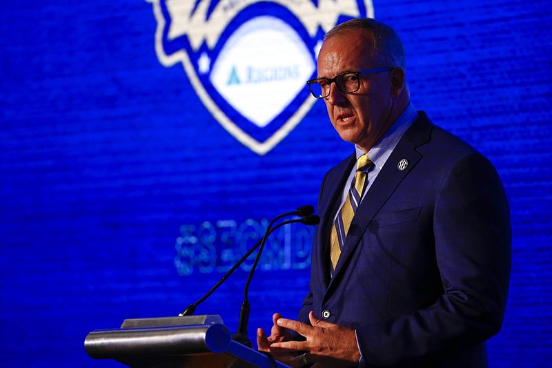 Greg Sankey speaks during the NCAA college football Southeastern Conference Media Days at the Hyatt Regency Birmingham-Wynfrey Hotel, Monday, July 15, 2019, in Hoover, Ala. (AP Photo/Butch Dill)