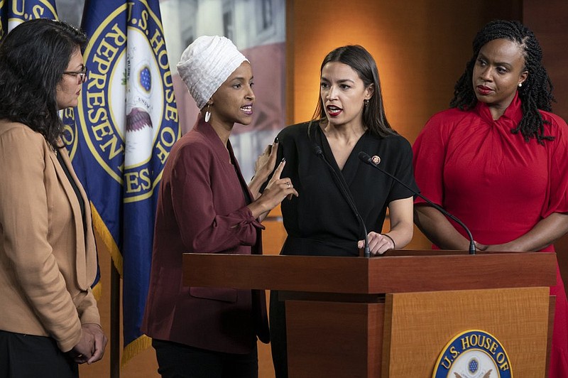 From left, Rep. Rashida Tlaib, D-Mich., Rep. Ilhan Omar, D-Minn., Rep. Alexandria Ocasio-Cortez, D-N.Y., and Rep. Ayanna Pressley, D-Mass., respond to remarks by President Donald Trump after his call for the four Democratic congresswomen to go back to their "broken" countries, during a news conference at the Capitol in Washington, Monday, July 15, 2019. All are American citizens and three of the four were born in the U.S. (AP Photo/J. Scott Applewhite)