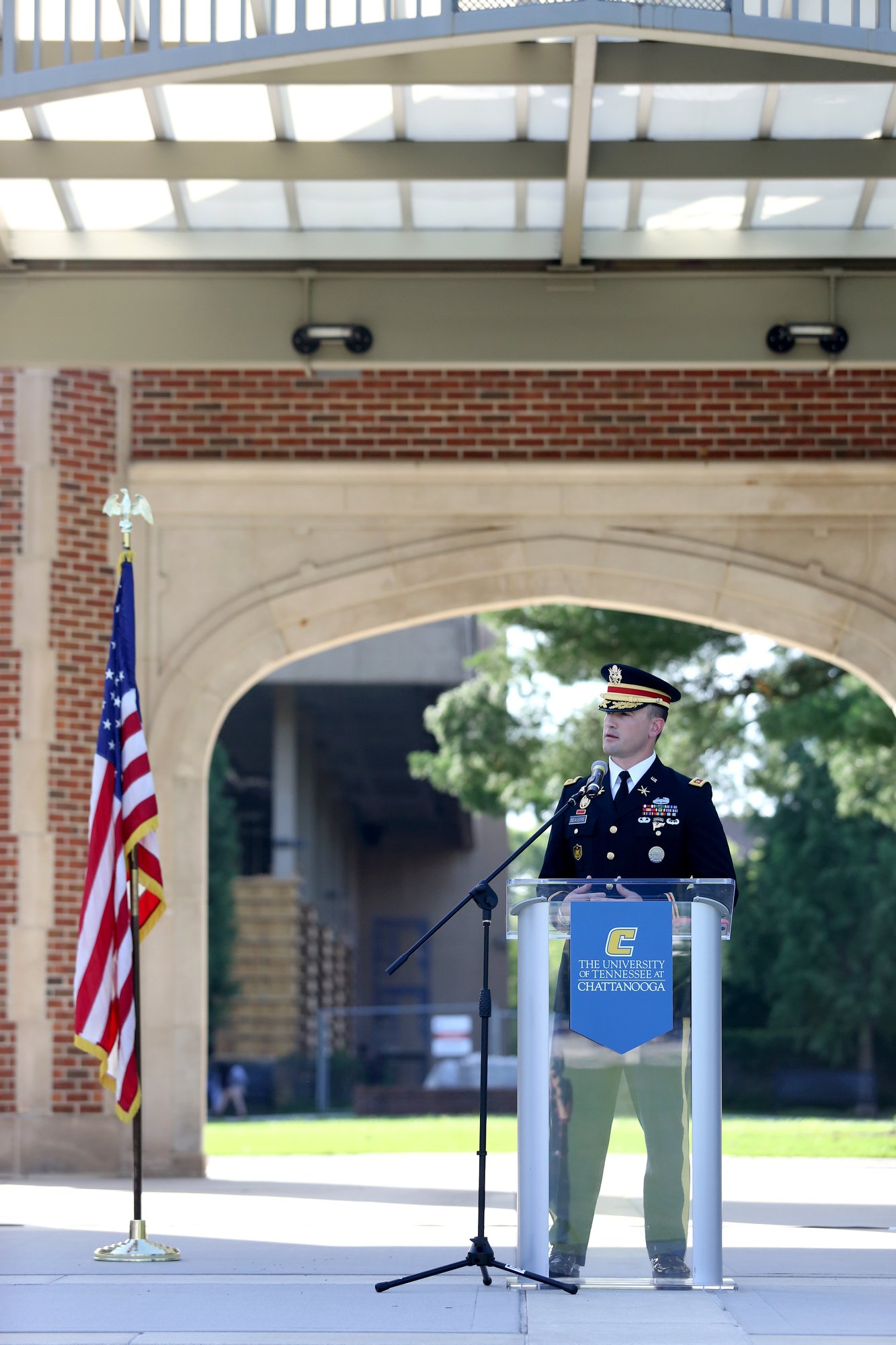Major Kevin Beavers, the head of the Department of Military Science at the University of Tennessee at Chattanooga, speaks during a ceremony to remember the Fallen Five at Chamberlain Field Pavilion at the University of Tennessee at Chattanooga. Sgt. Carson A. Holmquist; Gunnery Sgt. Thomas J. Sullivan; Staff Sgt. David A. Wyatt and Lance Cpl. Squire K. "Skip" Wells, all Marines, and Navy Petty Officer 2nd Class Randall J. Smith were killed in an attack on two Chattanooga military sites four years ago.