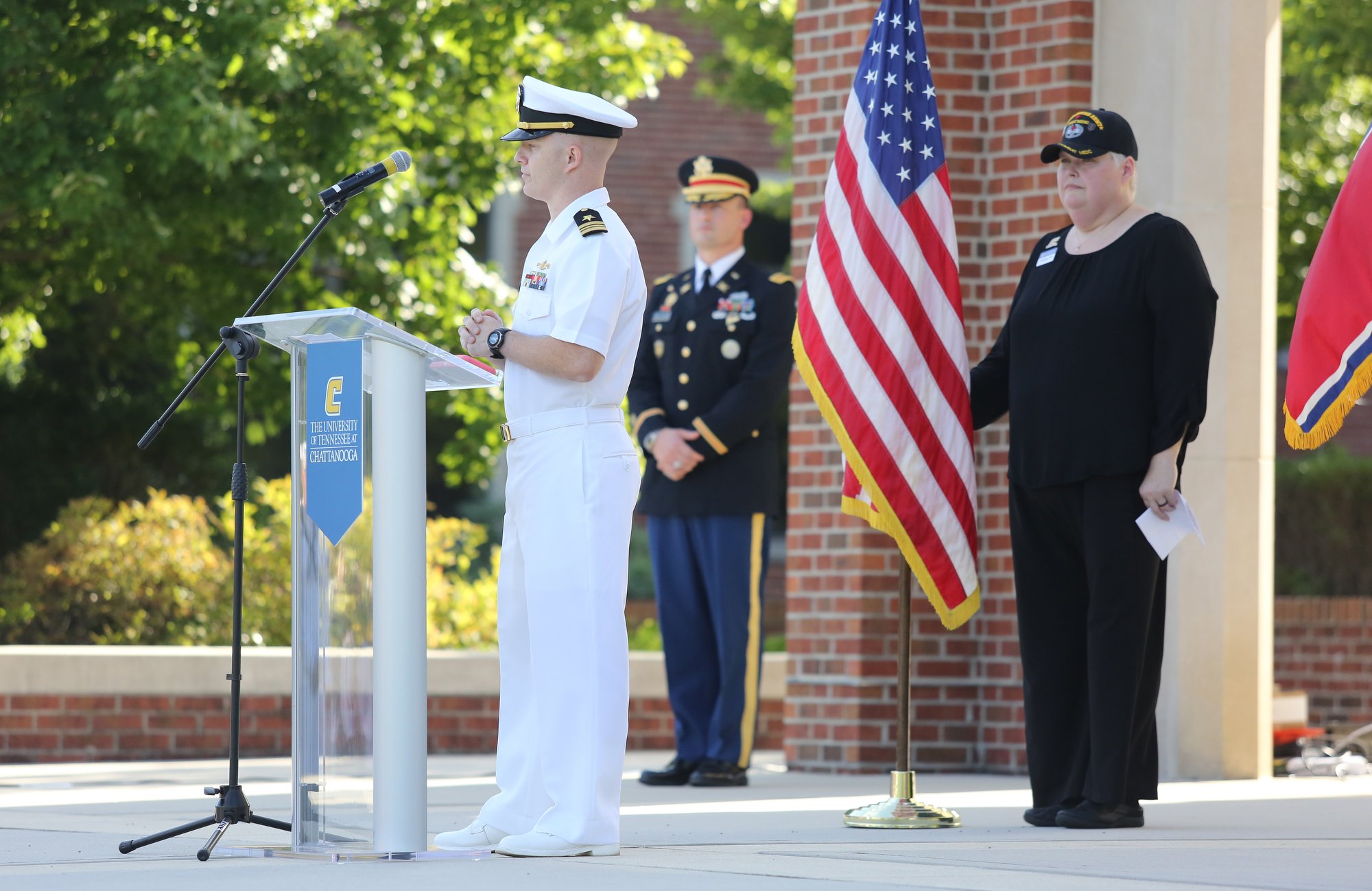 Lt. Commander PJ Remillard with the U.S. Navy Reserve in Chattanooga speaks during a ceremony to remember the Fallen Five at Chamberlain Field Pavilion at the University of Tennessee at Chattanooga. UTC staff, students and community members joined in to honor the four Marines and Sailor who lost their lives July 16, 2015 in an attack on two Chattanooga military facilities.