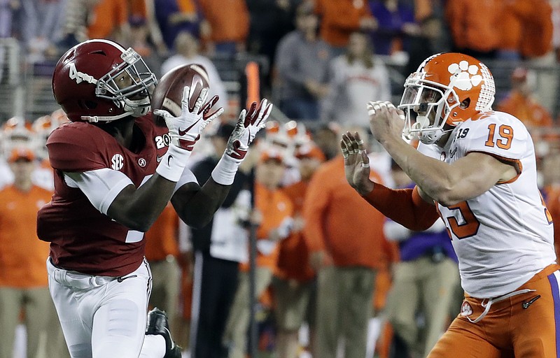 Alabama's Jerry Jeudy catches a touchdown pass in front of Clemson's Tanner Muse during the national championship game in January in Santa Clara, Calif. Alabama lost 44-16 to Clemson in what is the Crimson Tide's worst loss since Nick Saban took over as coach prior to the 2007 season.