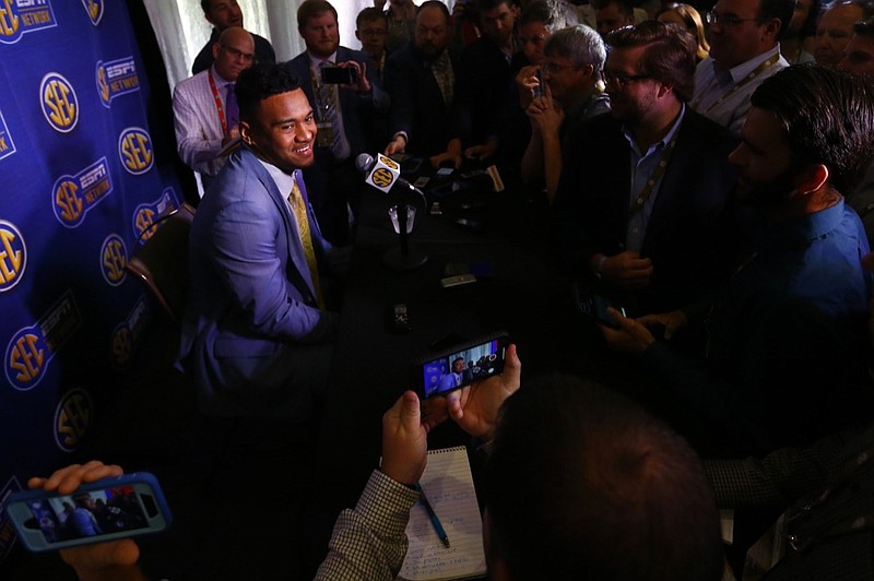 Alabama quarterback Tua Tagovailoa speaks to reporters during the NCAA college football Southeastern Conference Media Days, Wednesday, July 17, 2019, in Hoover, Ala. (AP Photo/Butch Dill)


