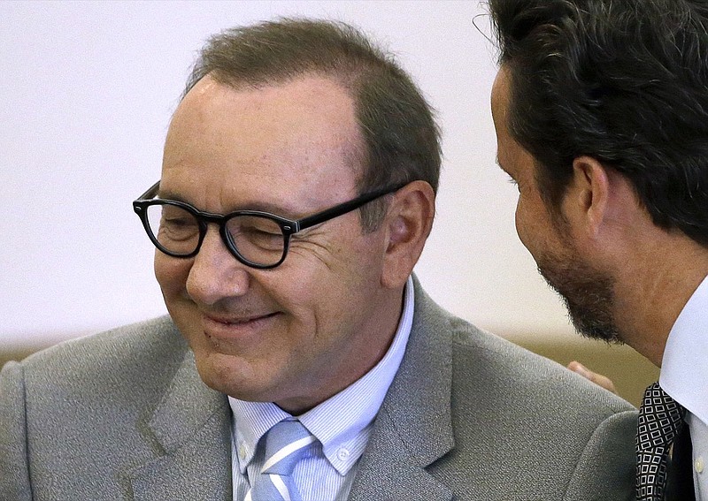 In this June 3, 2019, file photo, actor Kevin Spacey listens to attorney Alan Jackson during a pretrial hearing at district court in Nantucket, Mass. On Wednesday, July 17, prosecutors dropped the sexual assault case against Oscar-winning actor, who had been accused of groping 18-year-old man in 2016 in the crowded bar at the Club Car in Nantucket. (AP Photo/Steven Senne, File)