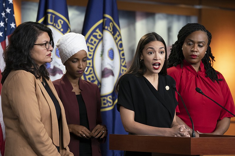 The self-named "Squad" of Democratic congresswomen who were suggested by President Trump to go back where they came from — from left, Rep. Rashida Tlaib, D-Michigan, Rep. Ilhan Omar, D-Minnesota, U.S. Rep. Alexandria Ocasio-Cortez, D-New York, and Rep. Ayanna Pressley, D-Massachusetts — were among the House members who voted to impeach Trump Wednesday.