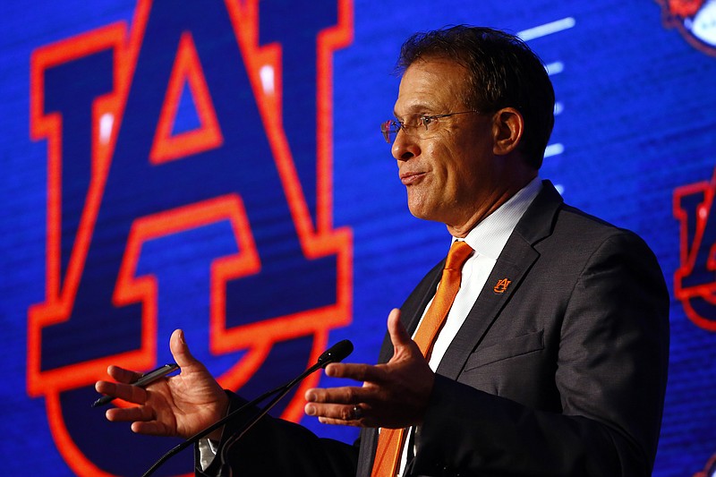 Auburn football coach Gus Malzahn speaks Thursday at SEC Media Days in Hoover, Ala. Malzahn is the league's only current coach with a head-to-head win against Nick Saban, but his job status appears shaky after the Tigers went 3-5 in SEC play with a lopsided loss to Alabama last season.