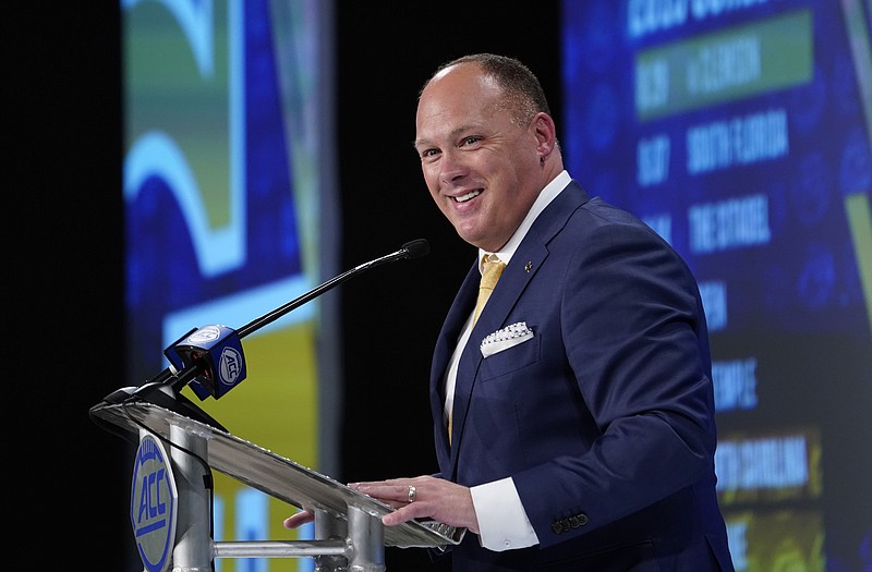 Georgia Tech football coach Geoff Collins speaks Thursday during ACC Media Days in Charlotte, N.C. Collins is entering his first season leading the Yellow Jackets after spending the past two years at Temple.