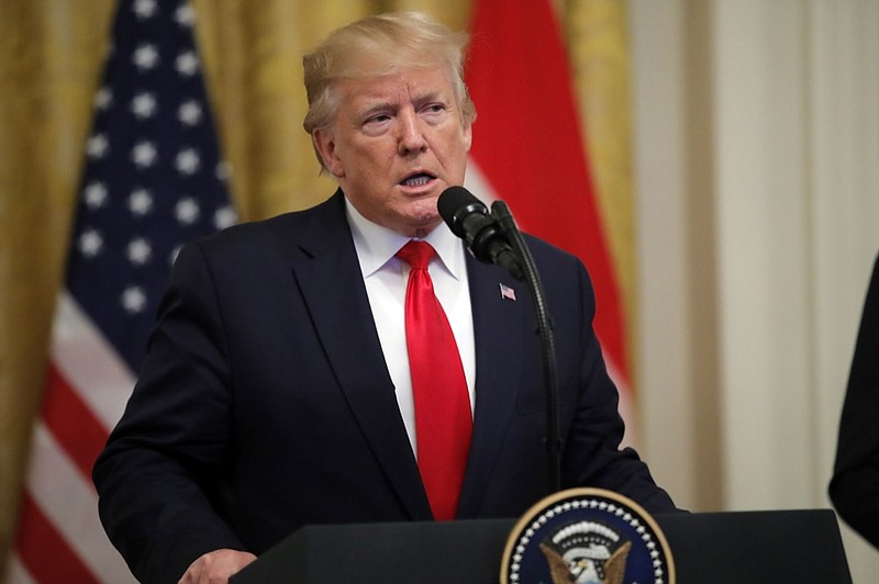 President Donald Trump speaks during a ceremony where Dutch Prime Minister Mark Rutte will present a 48-star flag flown on a U.S. Naval vessel during the D-Day invasion, in the East Room of the White House, Thursday, July 18, 2019, in Washington. The flag will be given to the Smithsonian's National Museum of American History. The vessel was control vessel Landing Craft, Control 60 (LCC 60). (AP Photo/Carolyn Kaster)
