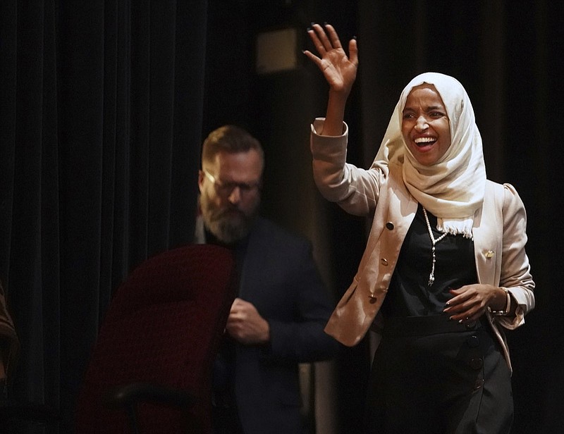 U.S. Rep. Ilhan Omar, D-Minn., holds a Medicare for All town hall with Rep. Pramila Jayapal, D-Wash., (not pictured) and other state lawmakers, Thursday, July 18, 2019, in Minneapolis. (Richard Tsong-Taatarii/Star Tribune via AP)