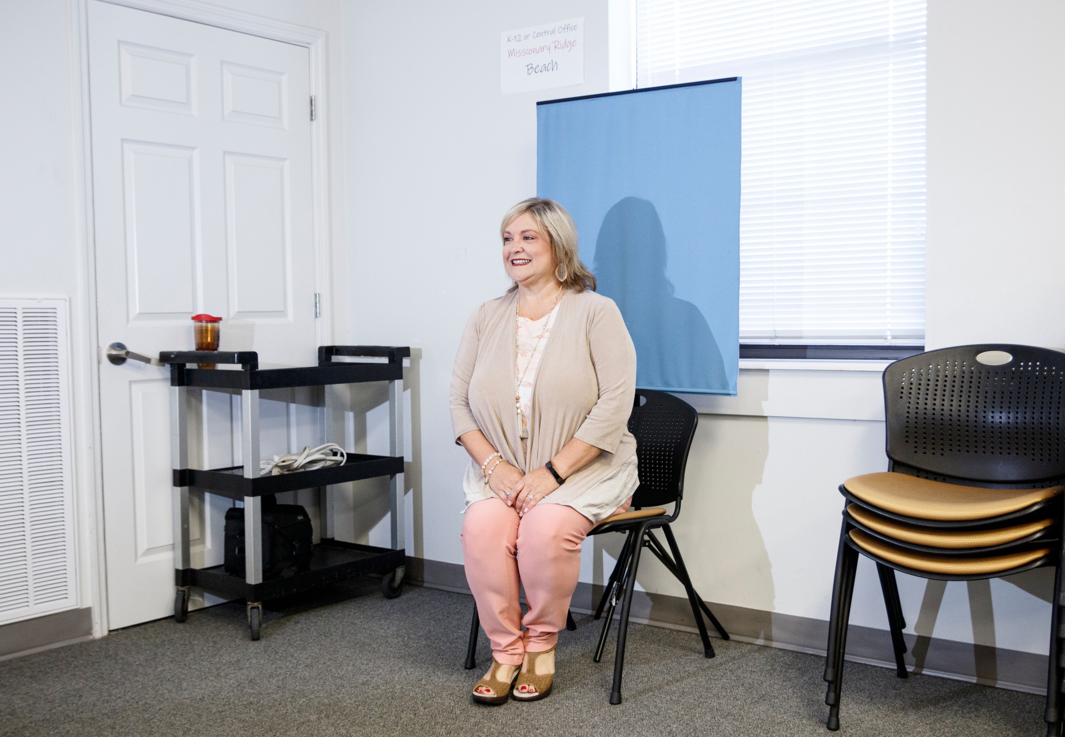 Janet Layne has her photograph taken during a new hire orientation at Hamilton County Schools Central Office on Wednesday, July 10, 2019, in Chattanooga, Tenn. Teachers and central office hires learned about working for the department during the orientation.