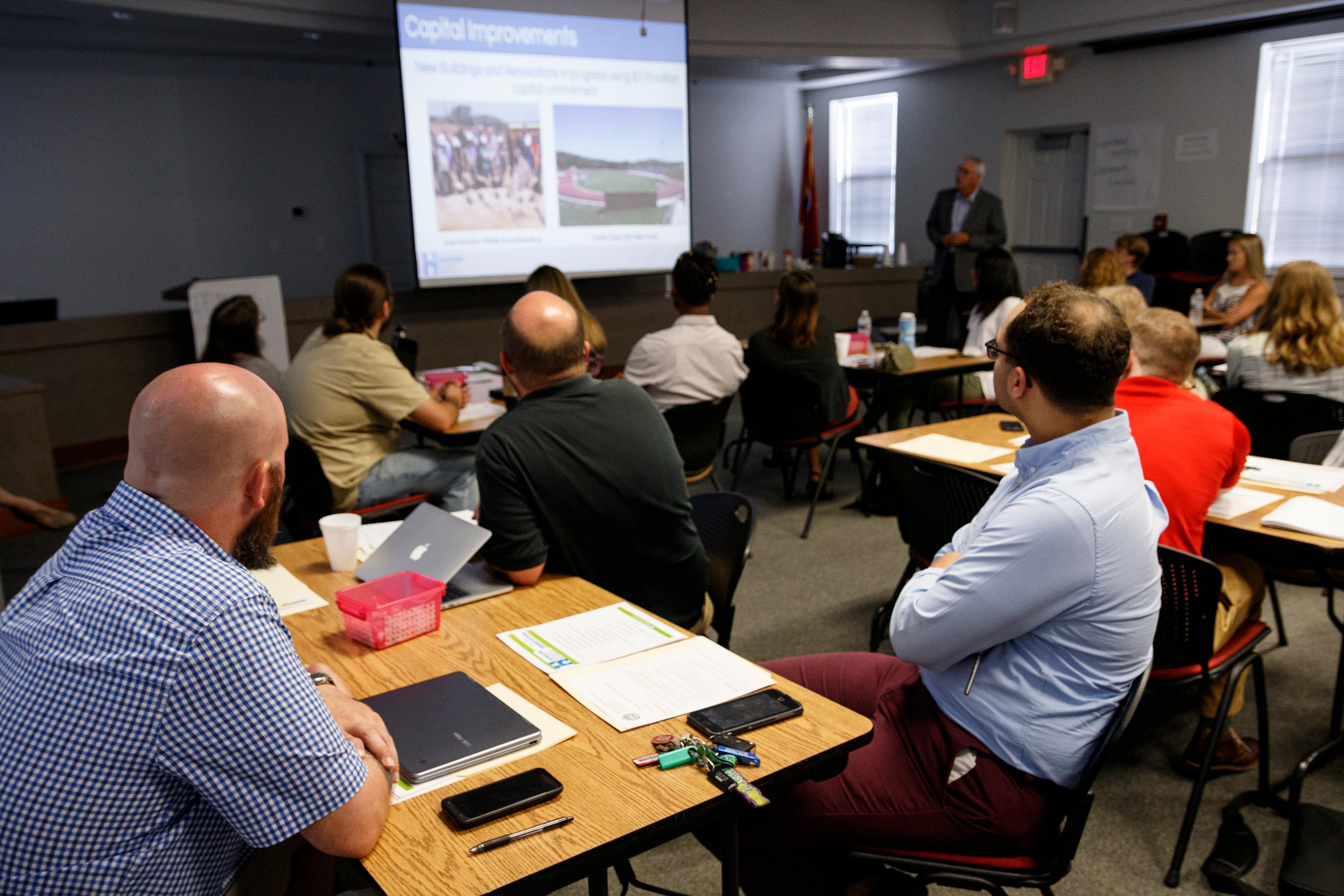 Educators listen as Chief Talent Officer Keith Fogleman speaks during a new hire orientation at Hamilton County Schools Central Office on Wednesday, July 10, 2019, in Chattanooga, Tenn. Teachers and central office hires learned about working for the department during the orientation.