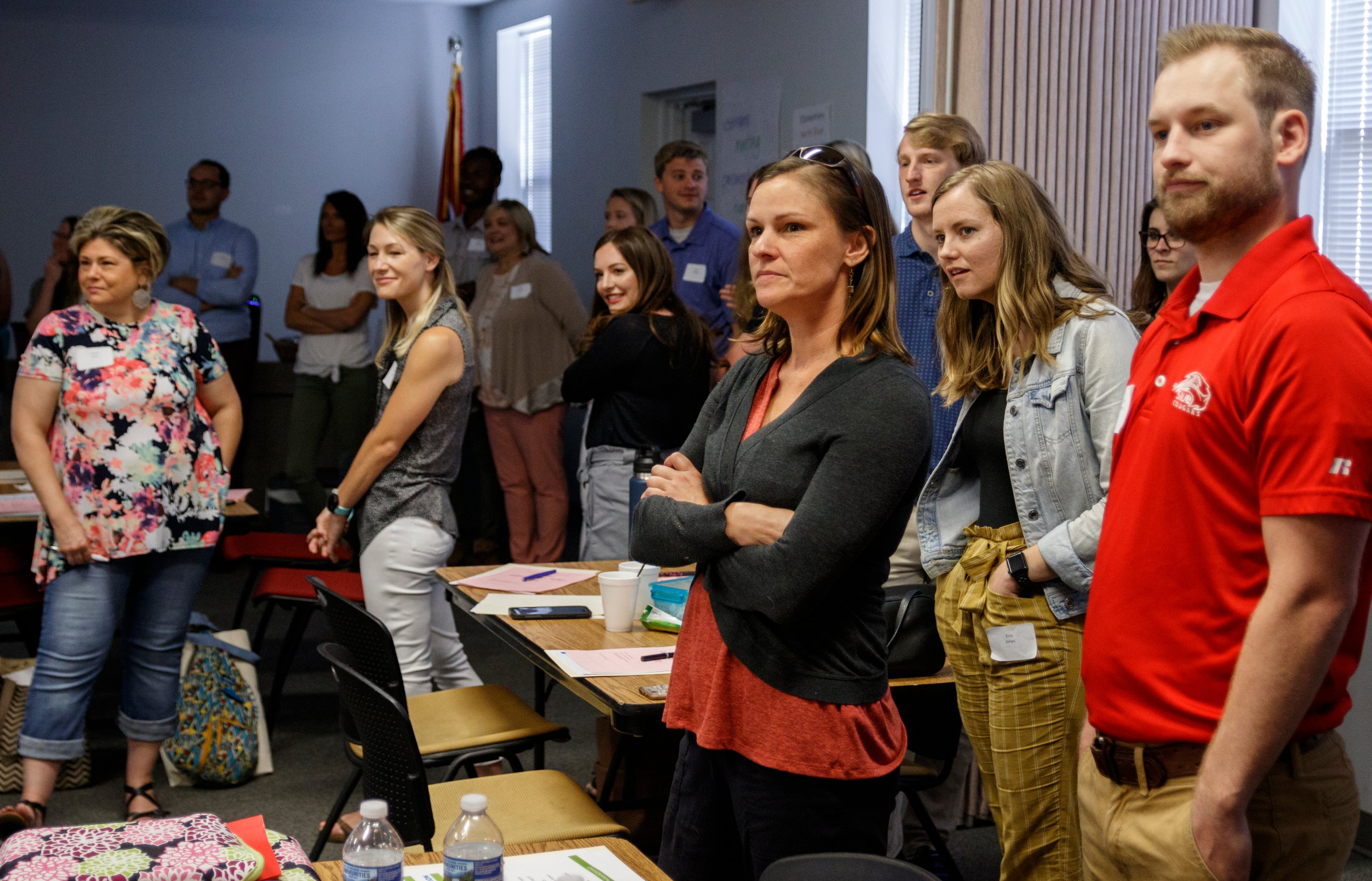 Educators participate in an icebreaker during a new hire orientation at Hamilton County Schools Central Office on Wednesday, July 10, 2019, in Chattanooga, Tenn. Teachers and central office hires learned about working for the department during the orientation.