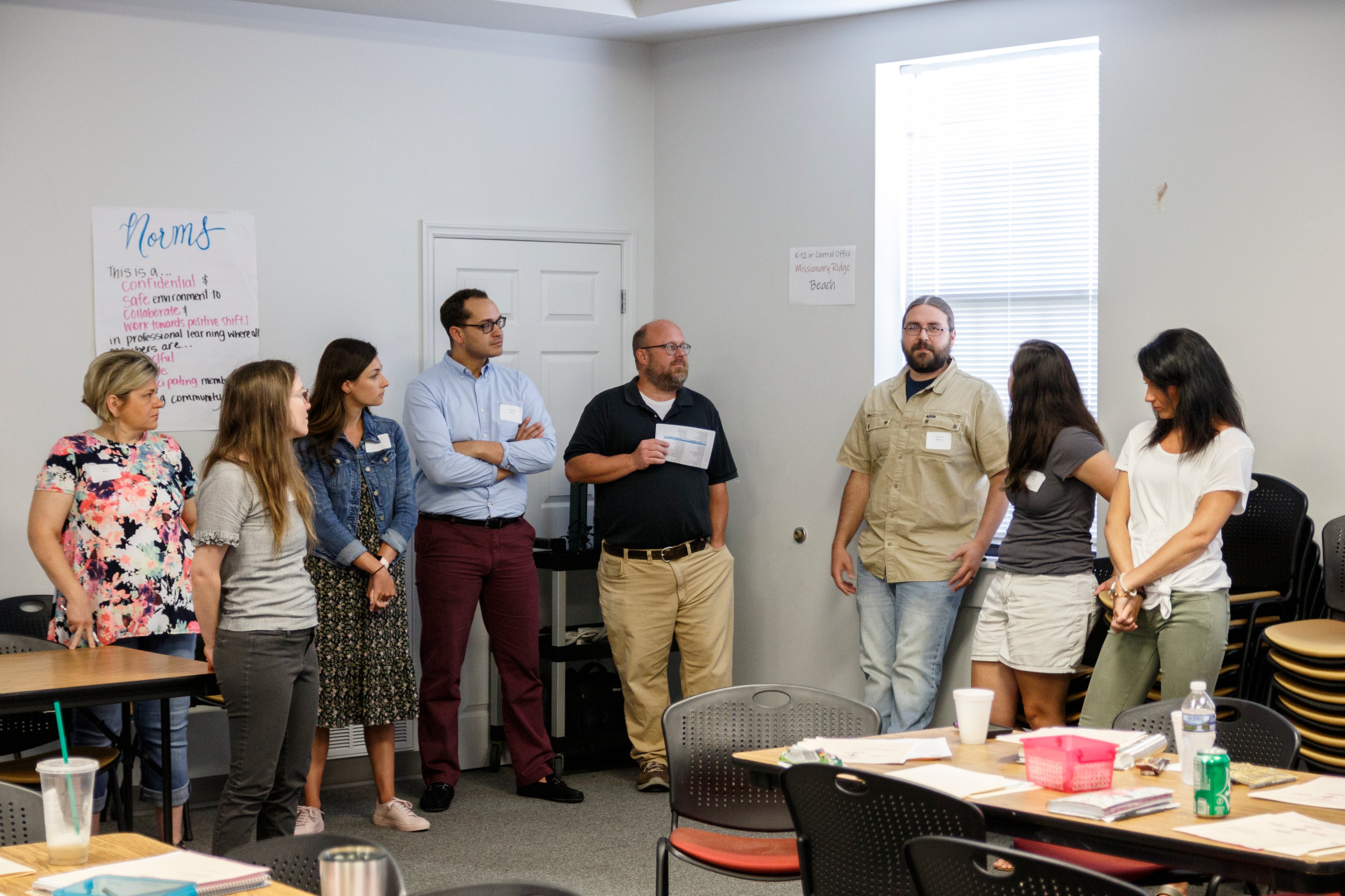 Educators participate in an icebreaker during a new hire orientation at Hamilton County Schools Central Office on Wednesday, July 10, 2019, in Chattanooga, Tenn. Teachers and central office hires learned about working for the department during the orientation.