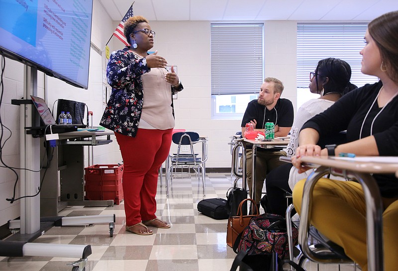 Luronda Jennings, a exceptional education lead teacher for the Opportunity Zone Schools, speaks during a breakout session on student disabilities during the Hamilton County Schools New Teacher Academy held at Hixson Middle School on Monday, July 22, 2019 in Hixson, Tennessee. The breakout session which was held to simulate student disabilities in order to give teachers a better understanding of some of the challenges their students face daily.