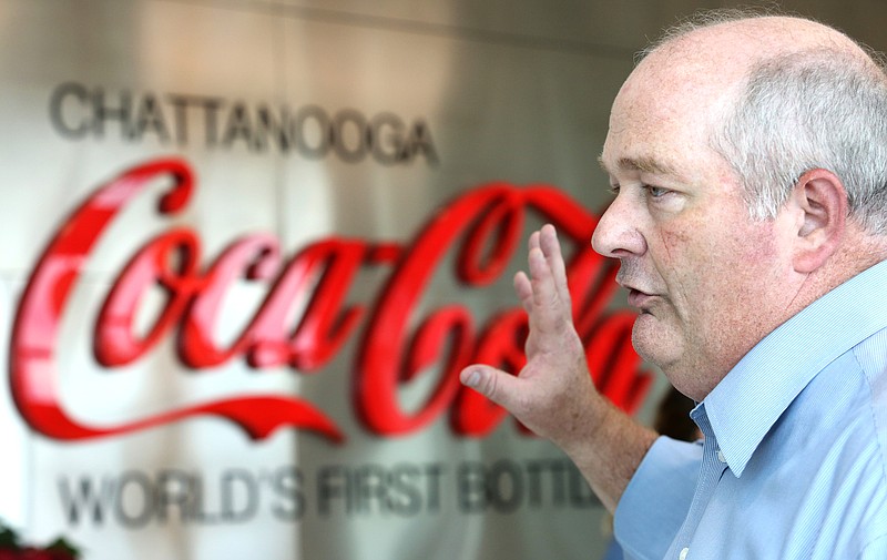 Darren Hodges, director of Coca-Cola United's Tennessee Valley Division, speaks with a reporter during the 120th anniversary event of Chattanooga Coca-Cola bottling company Monday, July 22, 2019 at Coca-Cola in Chattanooga, Tennessee.