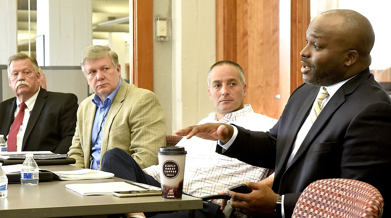 Staff Photo by Robin Rudd/
Hamilton County Schools Superintendent Bryan Johnson, right, comments on the facilities plan. Listening, from left, are Hamilton County Mayor Jim Coppinger, Tim Hensley APR Communications Officer Hamilton County Schools and Joe Wingate District 7 School Board Member. Hamilton County Schools Superintendent Bryan Johnson, Chief Operations Officers Ken Bradshaw, Director of Facilities Justin Witt, Mayor Jim Coppinger, other schools officials and Dan Schmidt Director Education Consulting Group for MGT Consulting Group spoke to the Times Free Press about the future of facilities on July 123, 2019.