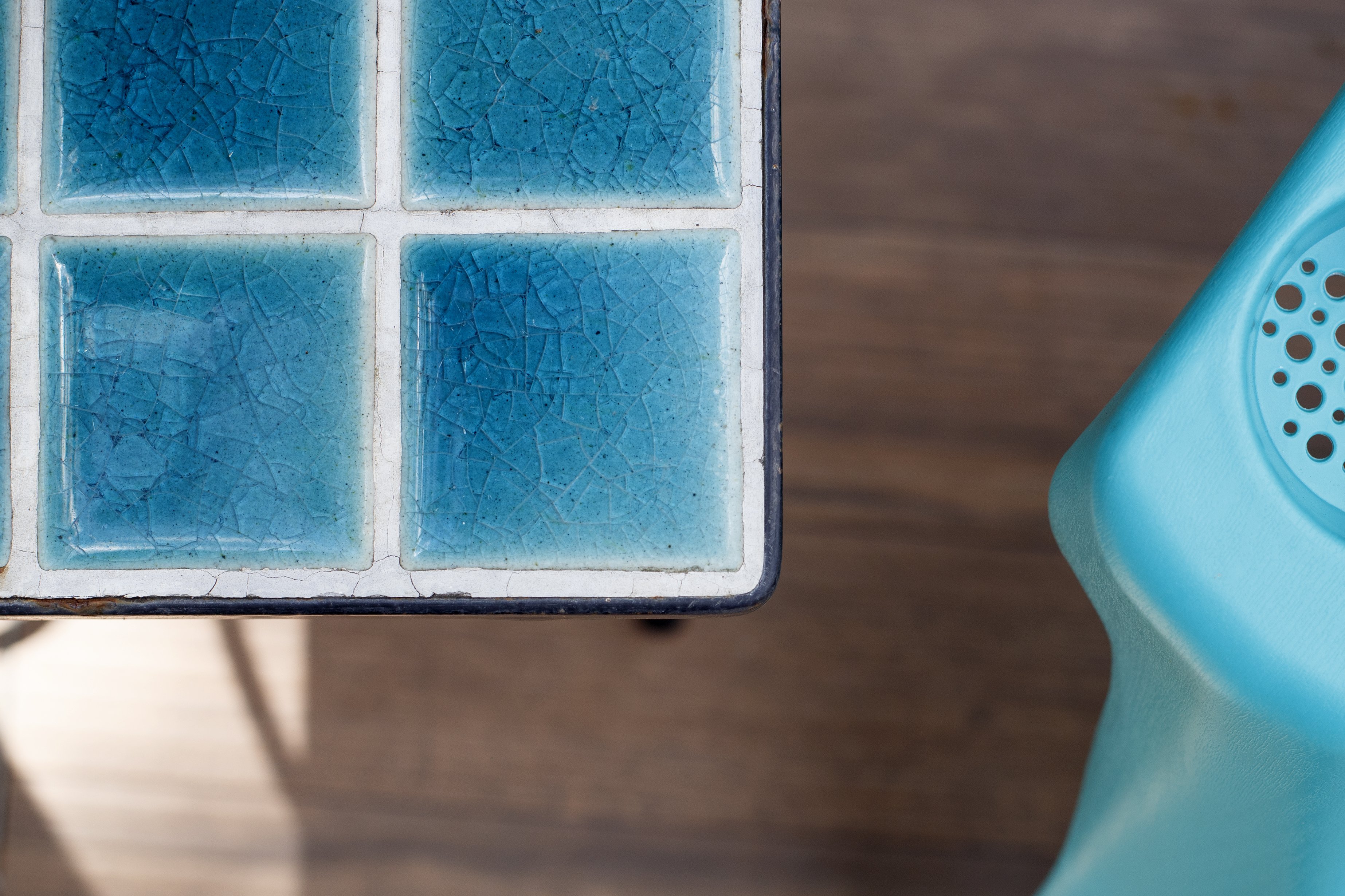 Detail of a backyard table purchased at a resale store.