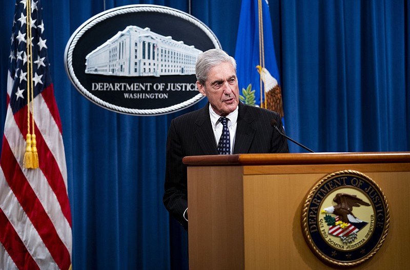 FILE — Robert Mueller, then special counsel, speaks about the Russia investigation at the Justice Department in Washington on May 29. After two years of silence and one brief public statement, the special counsel, Robert S. Mueller III, will finally sit for prolonged questioning at two House hearings today, beginning at 8:30 a.m. (Doug Mills/The New York Times)