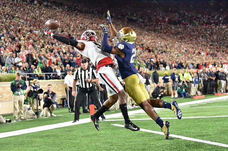 This one-handed touchdown catch by former Georgia receiver Terry Godwin helped the Bulldogs pull out a 20-19 victory at Notre Dame in 2017. The two teams are playing again this season in Athens, with CBS showing it in prime time. / Georgia photo/Perry McIntyre
