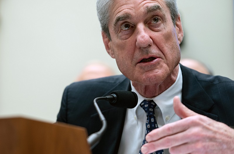 Former Special Counsel Robert Mueller testifies before the House Intelligence Committee in Washington on Wednesday. (Erin Schaff/The new York Times)