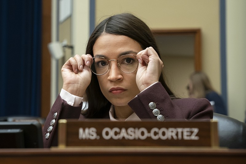 Rep. Alexandria Ocasio-Cortez, D-N.Y., attends a House Oversight Committee hearing on high prescription drugs prices shortly after her private meeting with Speaker of the House Nancy Pelosi, D-Calif., on Capitol Hill in Washington, Friday, July 26, 2019. The high-profile freshman and the veteran Pelosi have been critical of one another recently. (AP Photo/J. Scott Applewhite)