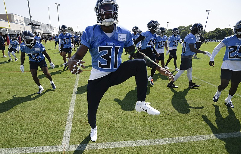 Titans free safety Kevin Byard (31) warms up during an NFL football practice at Saint Thomas Sports Park Saturday, July 27, 2019, in Nashville, Tenn. (George Walker IV/The Tennessean via AP)


