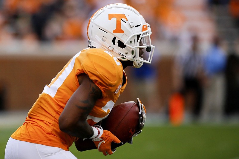 Orange Team defensive back Bryce Thompson (20) fields a kickoff during the Orange and White spring football game at Neyland Stadium on Saturday, April 13, 2019, in Knoxville, Tenn.