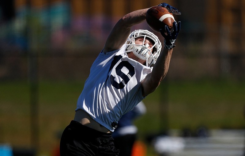 UTC receiver Bryce Nunnelly catches a pass on the first day of spring football practice at the University of Tennessee at Chattanooga's intramural athletic fields on Tuesday, March 19, 2019, in Chattanooga, Tenn.