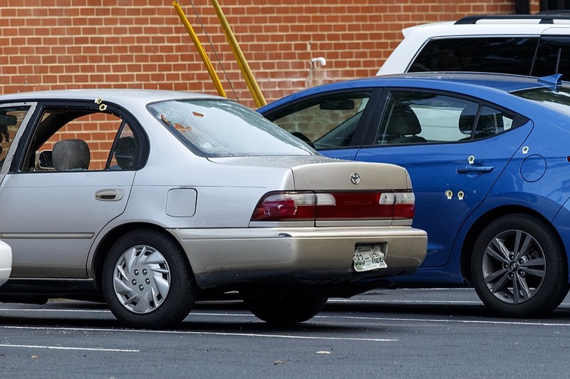 Staff photo by C.B. Schmelter / 
Bullet holes are seen on vehicles parked at the Hamilton Pines apartment complex on Tuesday, July 30, 2019 in Chattanooga, Tenn. A shooting in the 3300 block of Pinewood Avenue has left one person dead, Chattanooga police say. Police were called to the scene at about 2:31 a.m. and found a person trying to aid the victim. The victim died and the family is being notified. Police have requested video surveillance footage from apartment's management, and they are cooperating.