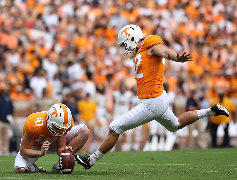 University of Tennessee's Joe Doyle (47) holds the ball for Brent Cimaglia (42) as he scores a field goal during the first half of the UT vs. ETSU football game at Neyland Stadium Saturday, Sept. 8, 2018, in Knoxville, Tennessee.