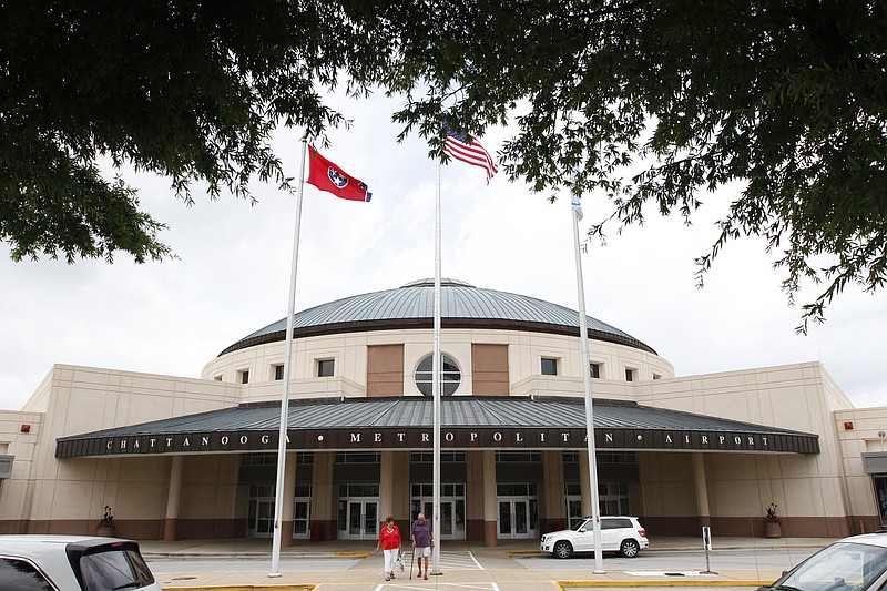 Travelers leave the Chattanooga Metropolitan Airport in this 2014 photo. 