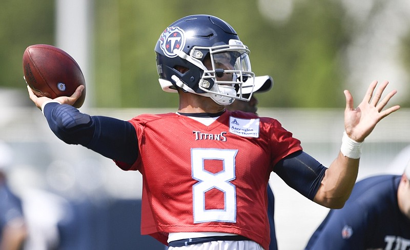 Tennessee Titans NFL football quarterback Marcus Mariota (8) throws a pass during practice at Saint Thomas Sports Park Friday, July 26, 2019, in Nashville, Tenn. (George Walker IV/The Tennessean via AP)