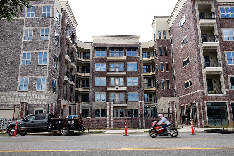 An apartment building under construction at 1701 Broad Street, adjacent to the Pilgrims Pride processing facility, is seen on Thursday, July 25, 2019, in Chattanooga, Tenn. 